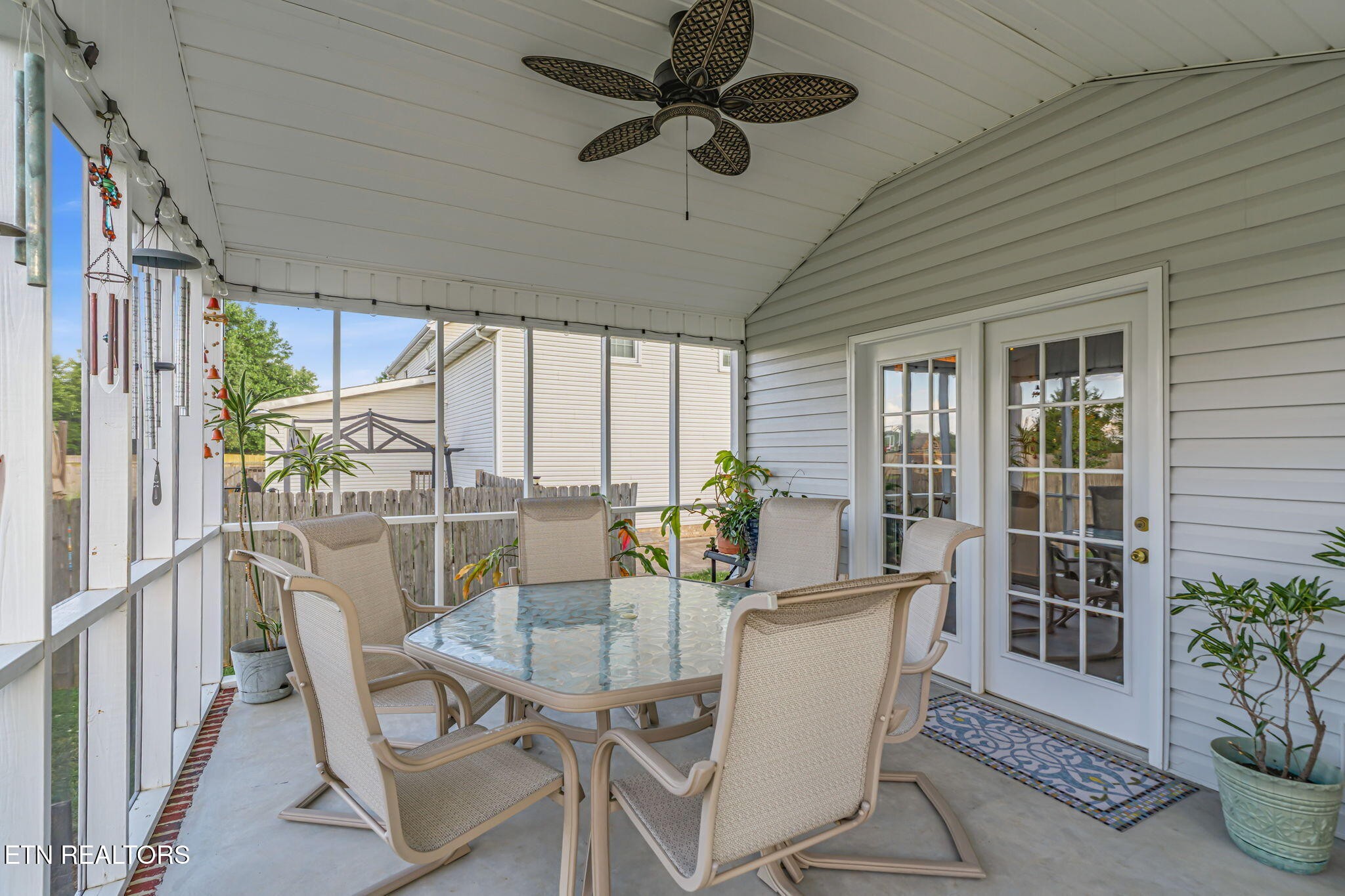 7030 Westerly Winds Road Knoxville, TN 37931 - Photo 14 of 40 a dining room with furniture window and wooden floor