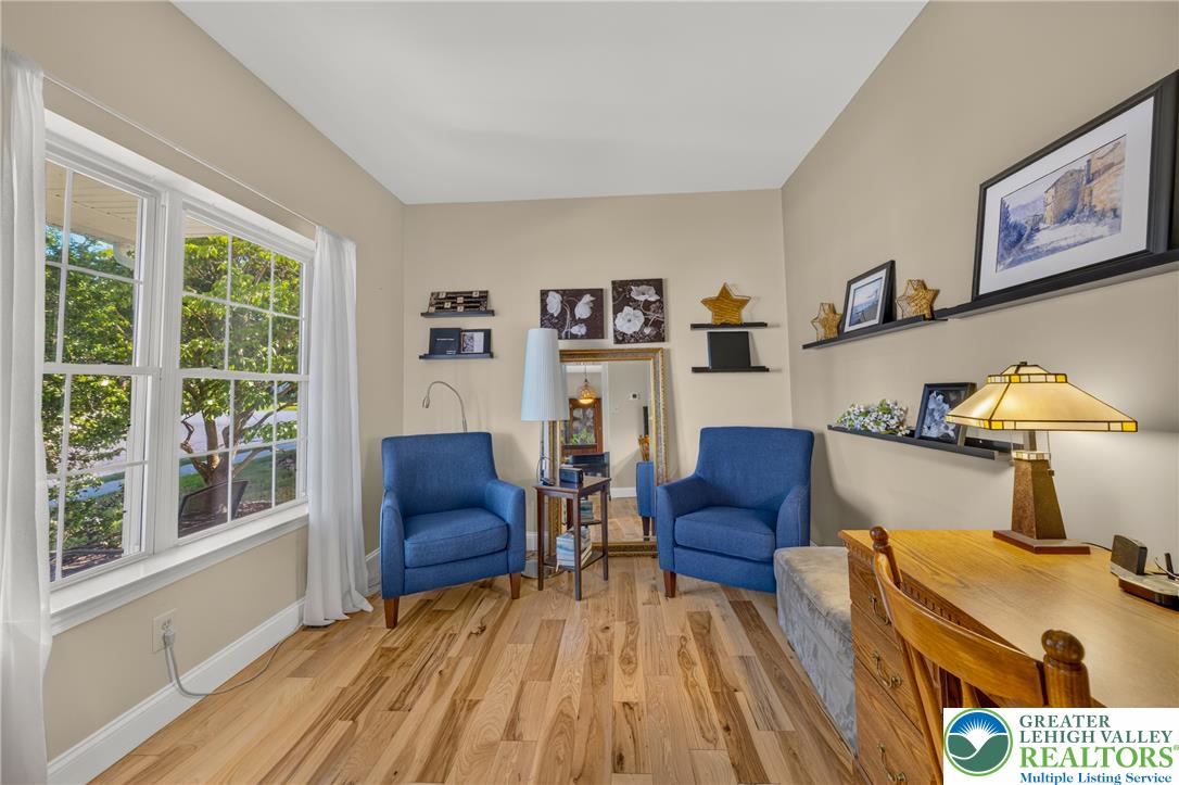 1702 Red Bud Road Quakertown, PA 18951 - Photo 6 of 68 Hardwood floors and generous natural light create an inviting atmosphere in this versatile room.