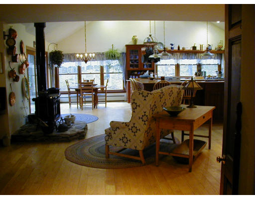 291 Ball Hill Road Princeton, MA 01541 - Photo 16 of 30 a living room with furniture and a gym equipment