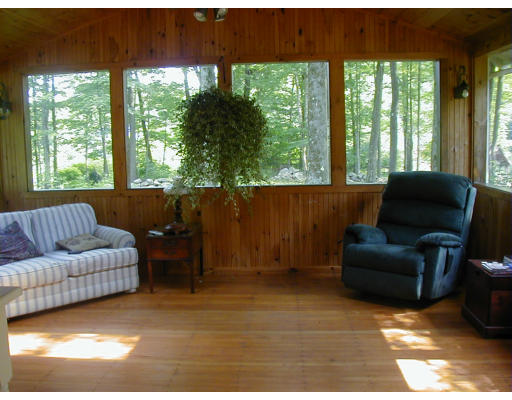 291 Ball Hill Road Princeton, MA 01541 - Photo 24 of 30 a living room with furniture and a large window