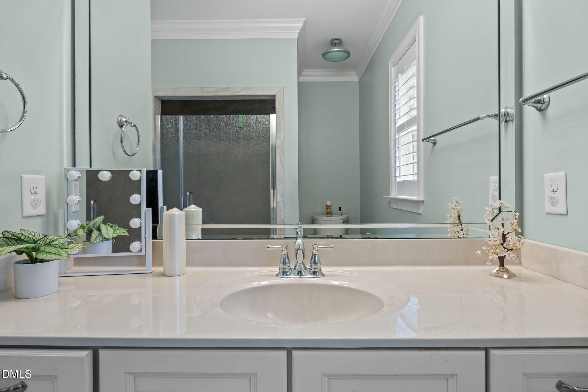 2880 Elevation Road Four Oaks, NC 27524 - Photo 36 of 51 a bathroom with a sink and a mirror