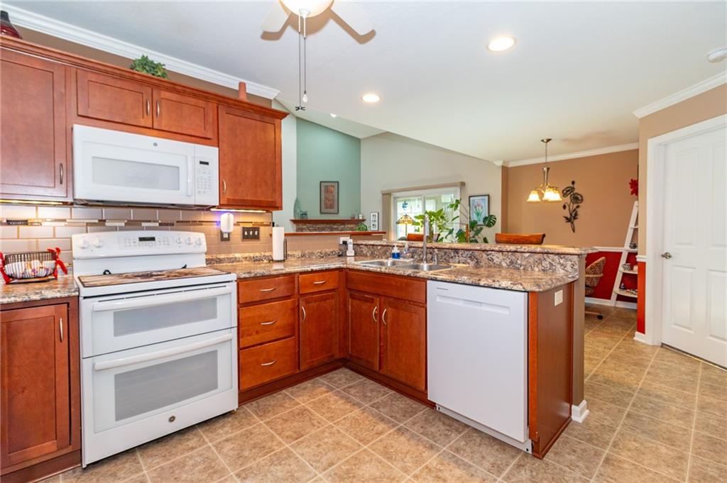 425 Chestnut Lane Apollo, PA 15613 - Photo 10 of 48 a kitchen with stainless steel appliances a sink stove and cabinets