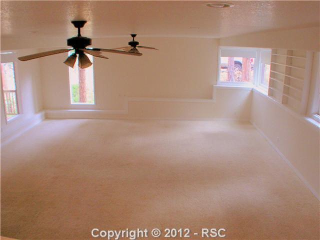 8211 Inca Road Larkspur, CO 80118 - Photo 8 of 24 Other side of the family room.