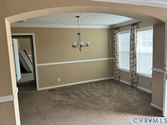 15910 Nobles Road Disputanta, VA 23842 - Photo 12 of 38 Unfurnished dining area featuring arched walkways,