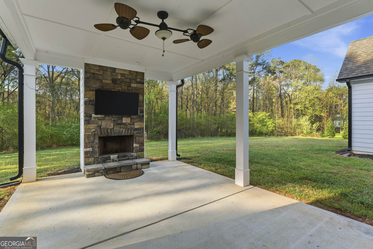 1058 Lawshe Road Senoia, GA 30276 - Photo 13 of 48 a view of a porch and garden