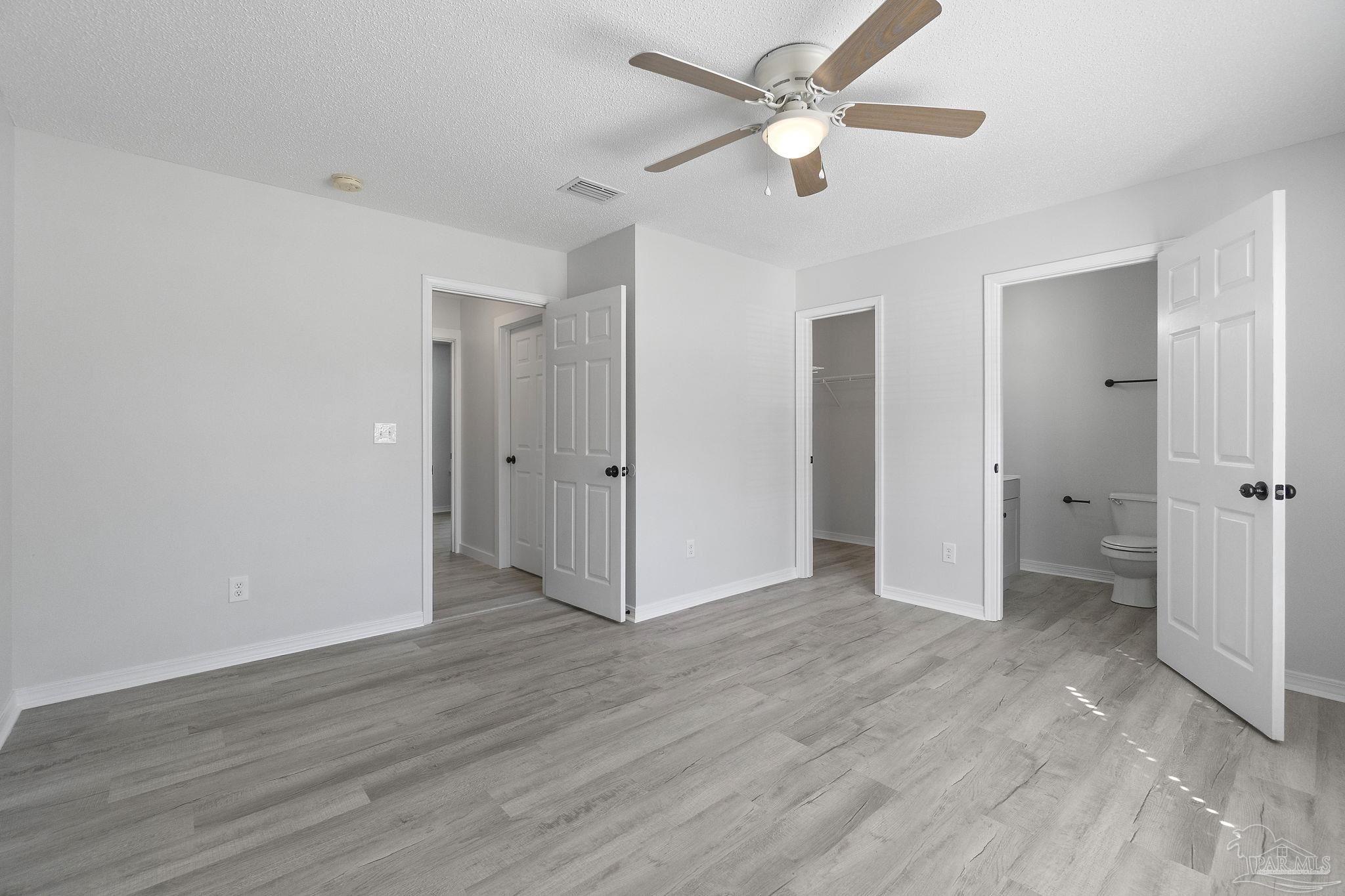 7253 Pro Lane Milton, FL 32570 - Photo 17 of 33 a view of an empty room and a ceiling fan window