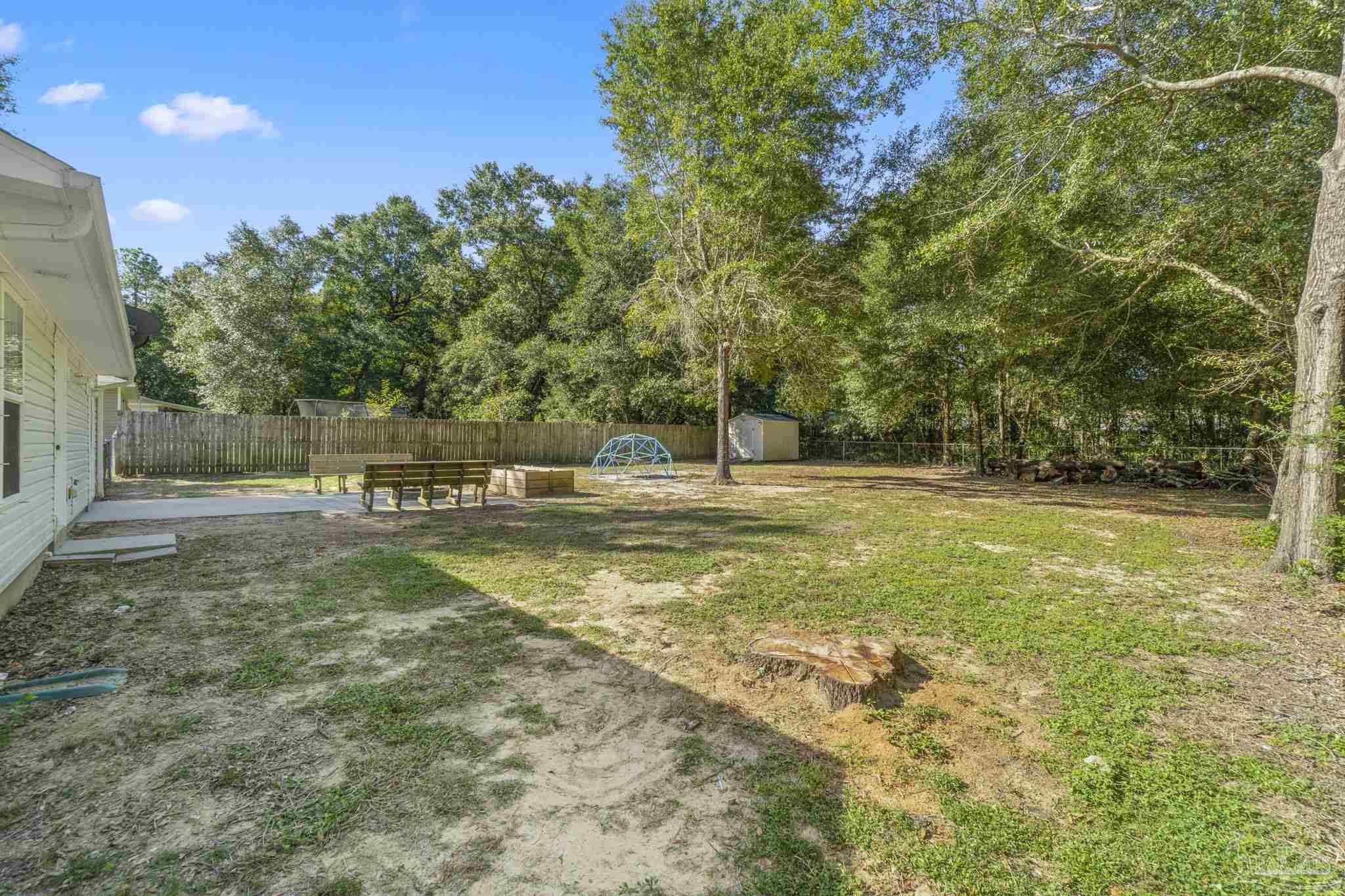 7253 Pro Lane Milton, FL 32570 - Photo 33 of 33 a view of outdoor space with garden