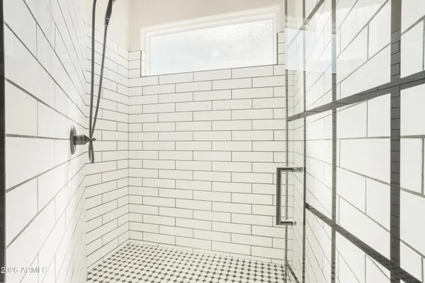 a view of a bathroom from a hallway