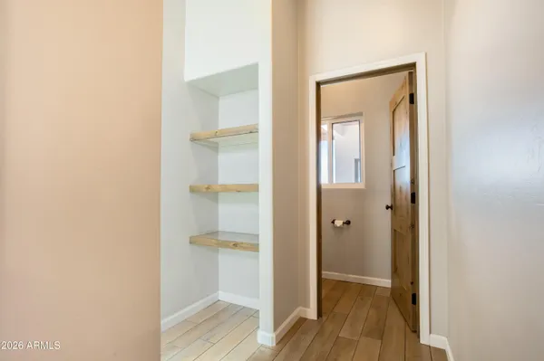 a view of an empty walk in closet