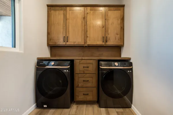 a view of a storage & utility room with closet