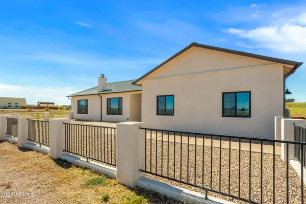 a view of a house with a roof deck