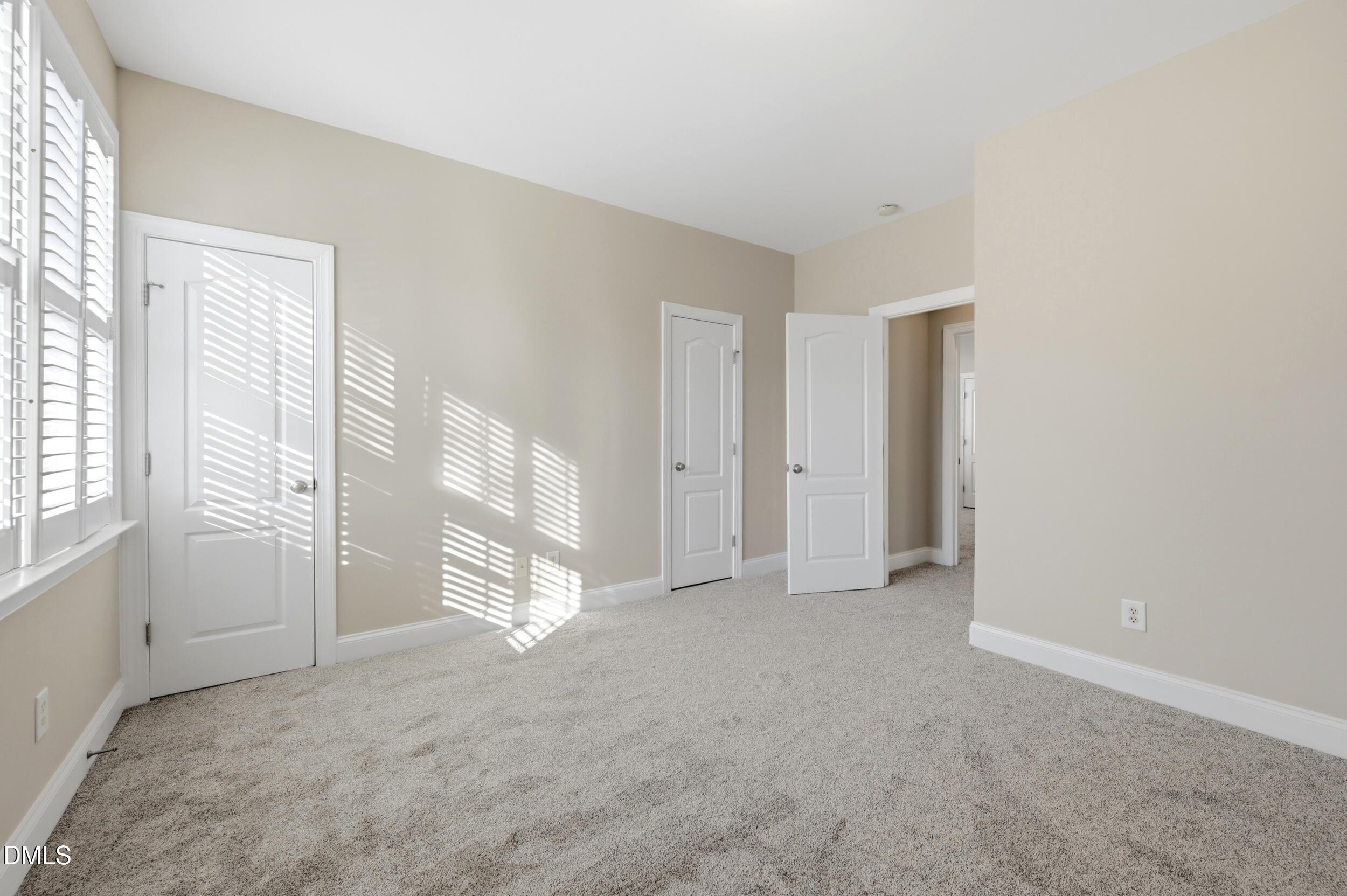 4803 Marena Place Durham, NC 27707 - Photo 27 of 42 an empty room with windows