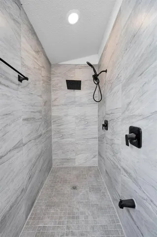 a bedroom with furniture and a baby crib