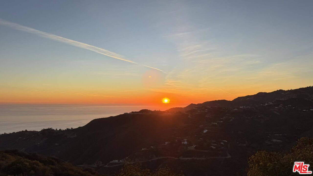 2195 Little Las Flores Road Topanga, CA 90290 - Photo 2 of 32 a view of sunset and mountains