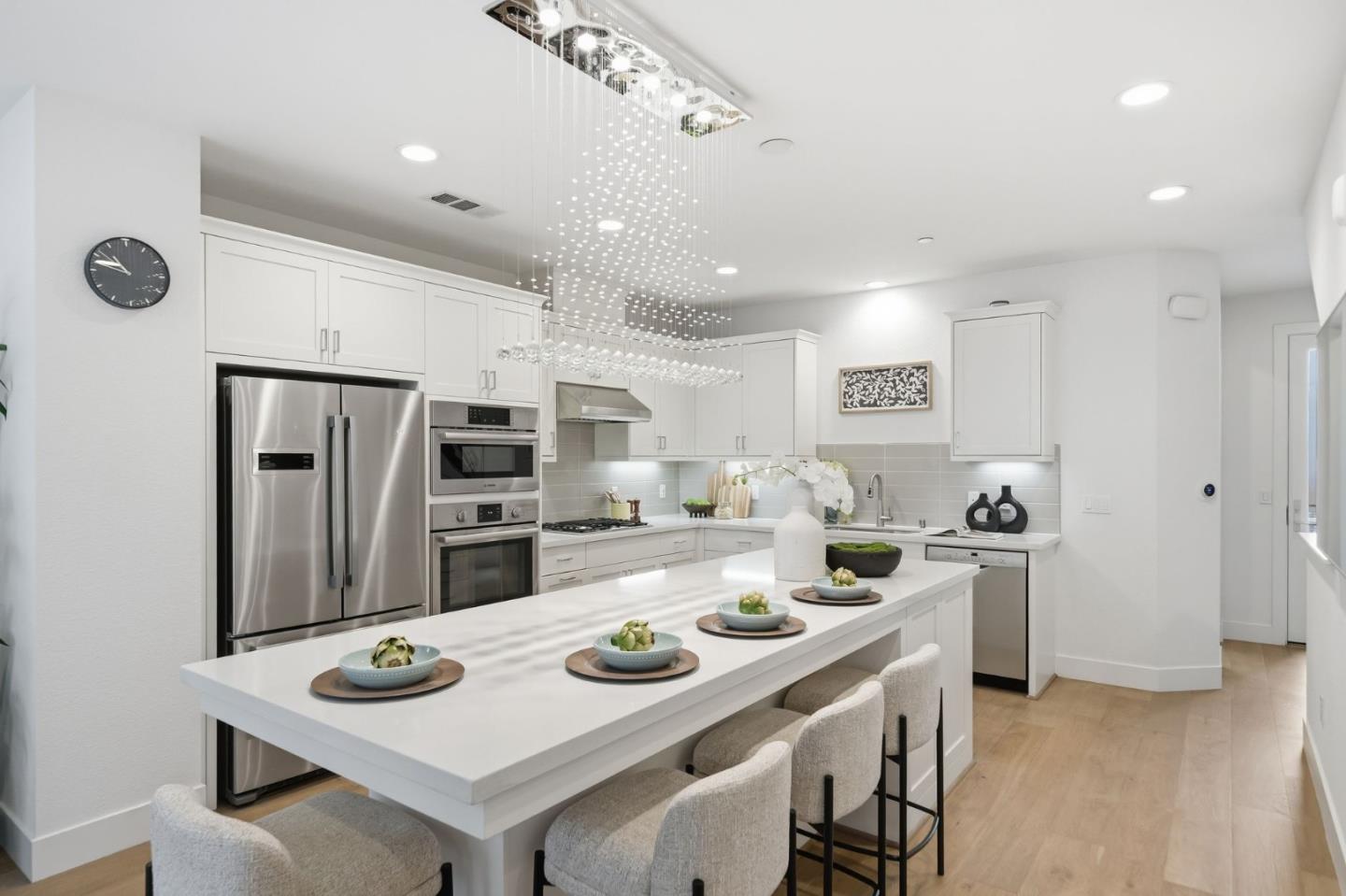 39124 Memorial Street Fremont, CA 94538 - Photo 11 of 40 a kitchen with refrigerator and white cabinets