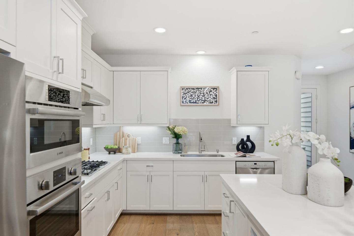 39124 Memorial Street Fremont, CA 94538 - Photo 12 of 40 a kitchen with a sink cabinets and stainless steel appliances