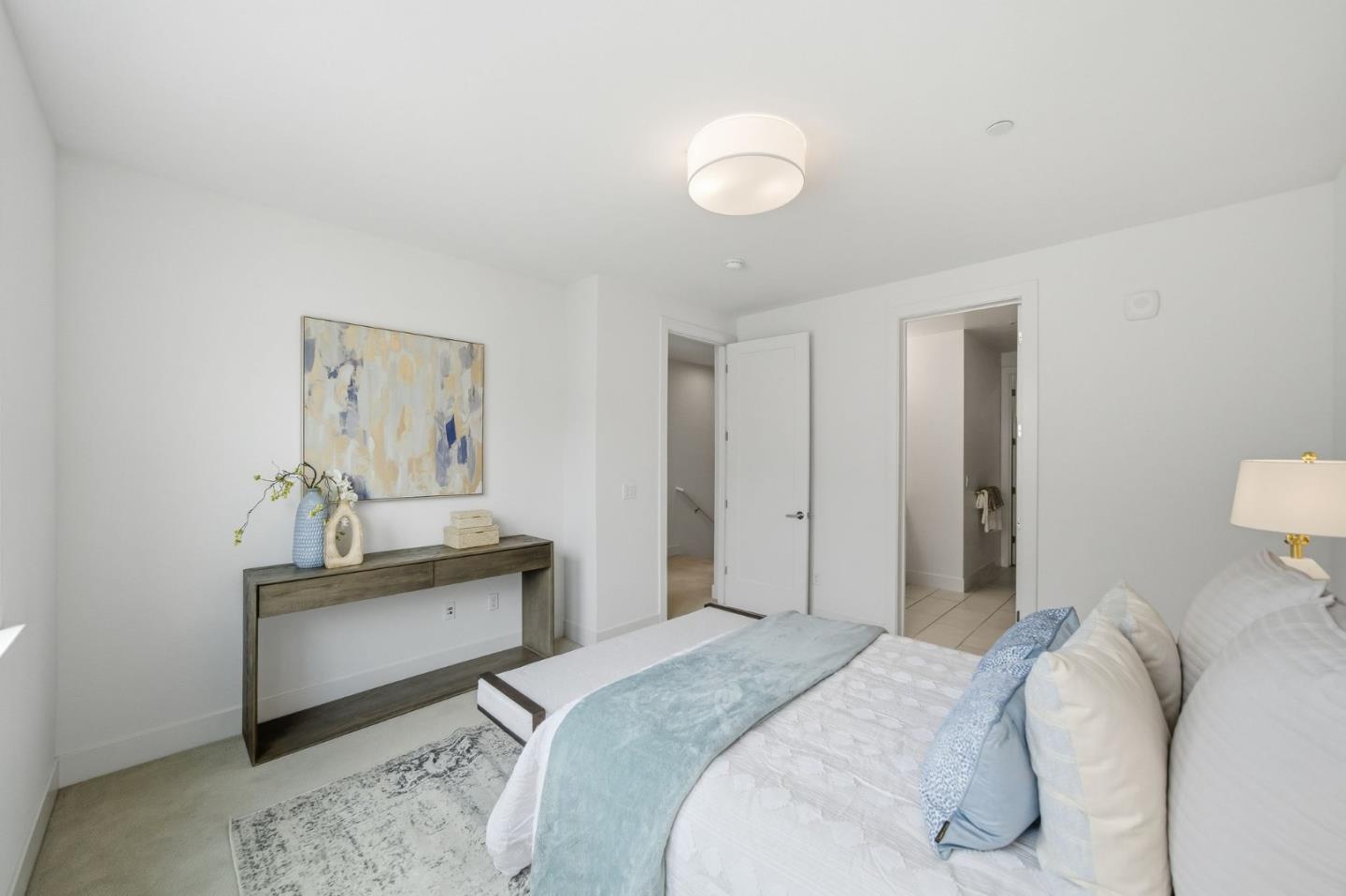 39124 Memorial Street Fremont, CA 94538 - Photo 30 of 40 a bedroom with a bed and a lamp on table