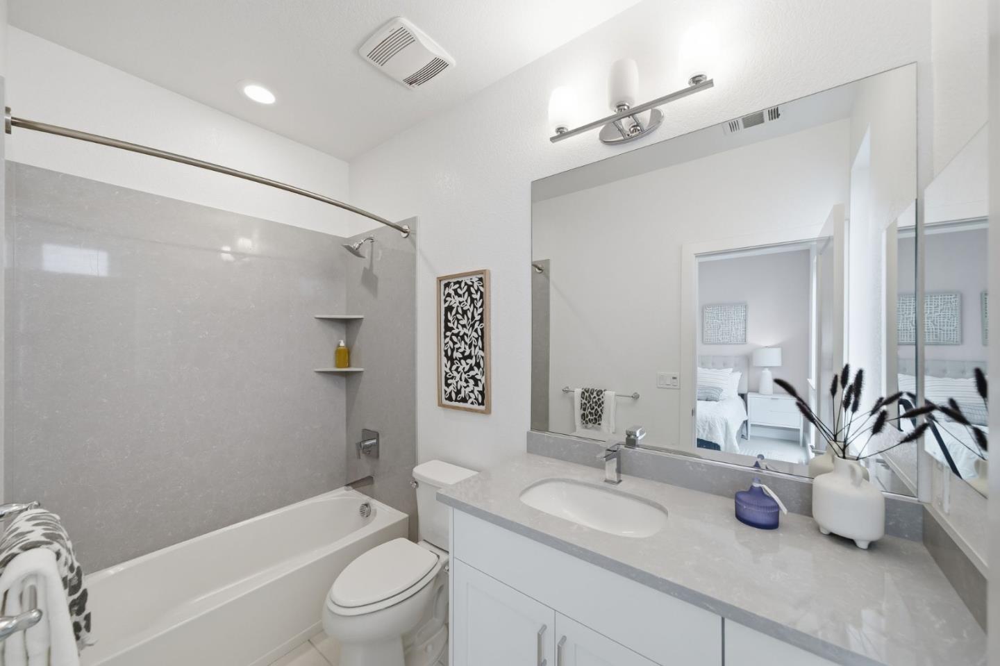 39124 Memorial Street Fremont, CA 94538 - Photo 37 of 40 a bathroom with a granite countertop sink a toilet and shower