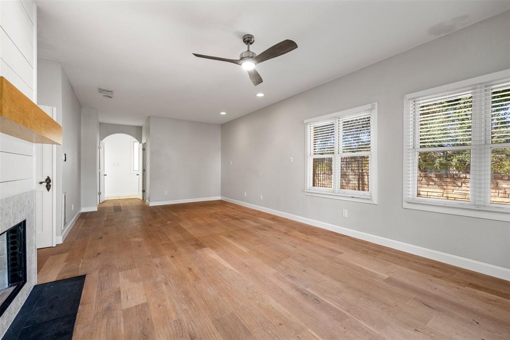 6 Sunview Road The Hills, TX 78738 - Photo 8 of 19 a view of a livingroom with a ceiling fan and window