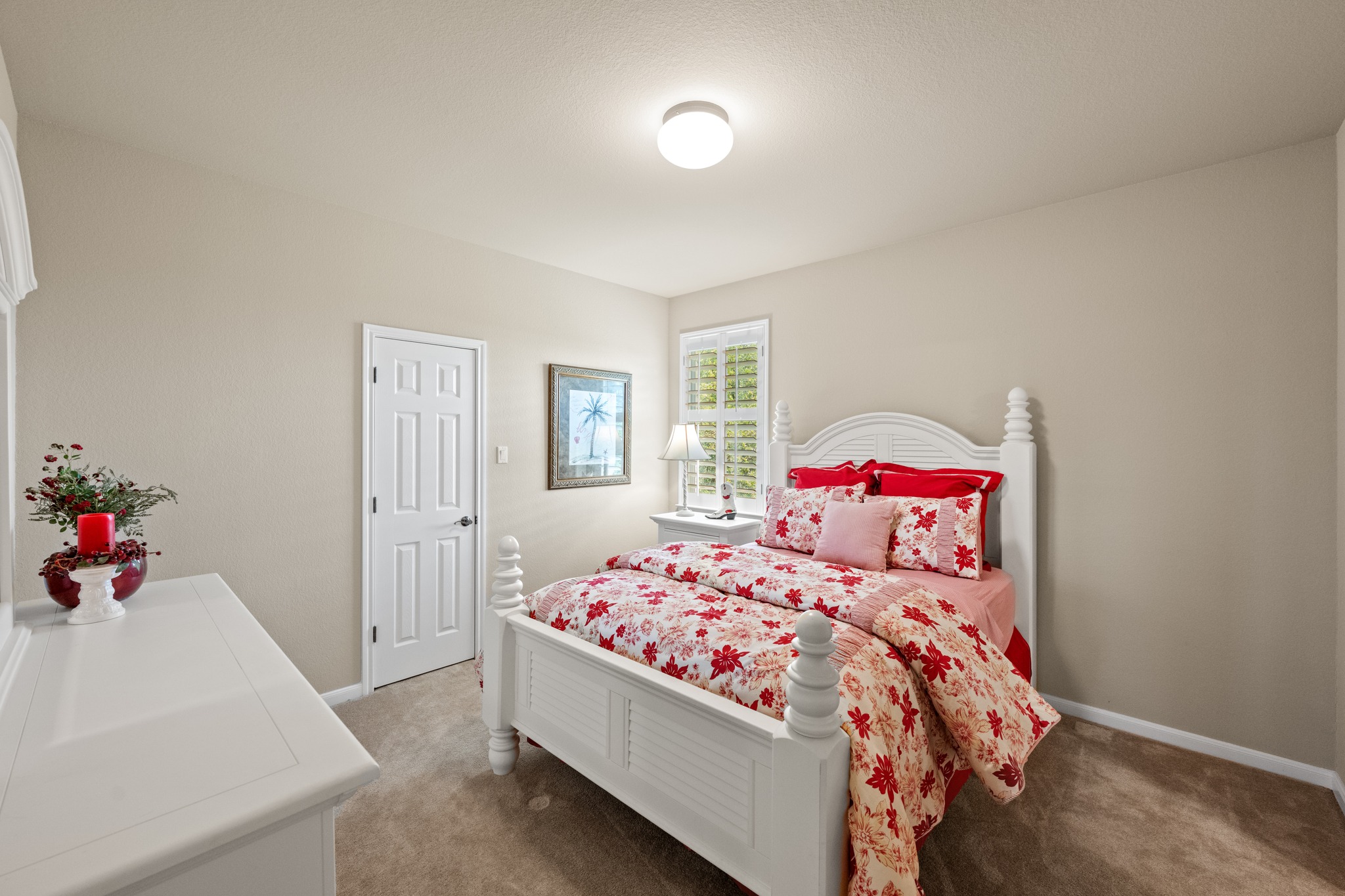 14608 Spillman Ranch Loop Austin, TX 78738 - Photo 26 of 31 a bedroom with a bed and wooden floor