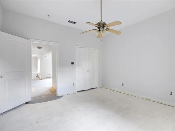 a view of an empty room and window