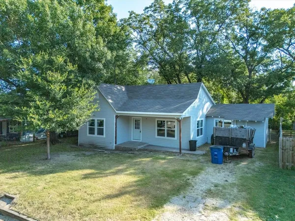 a house view with a garden space