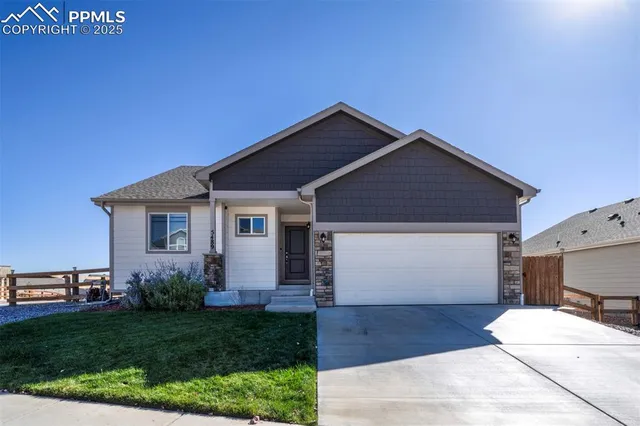 a front view of house with yard