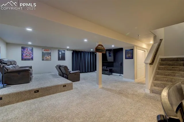 a bed room with a bed and a television