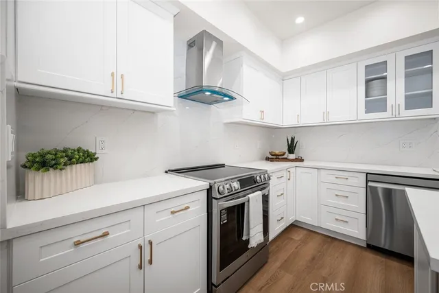 a bedroom with a bed and a mirror