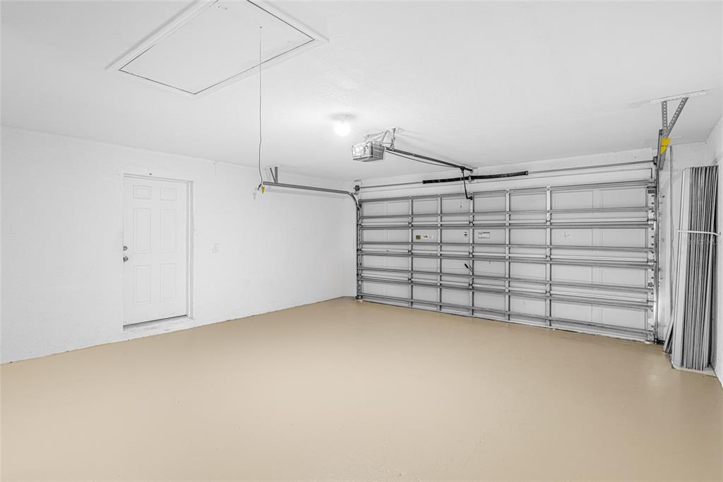 418 Windermere Drive Lehigh Acres, FL 33972 - Photo 49 of 71 a view of a garage