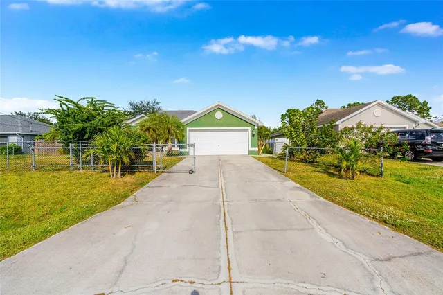 $344,800 | 418 Windermere Drive, Lehigh Acres, FL 33972