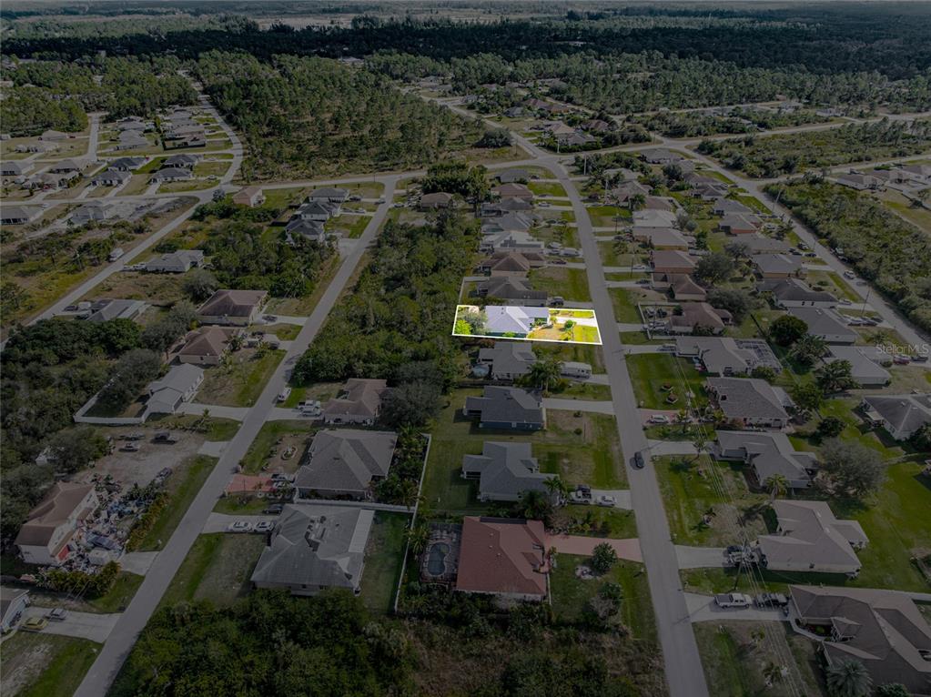 418 Windermere Drive Lehigh Acres, FL 33972 - Photo 68 of 71 an aerial view of multiple house
