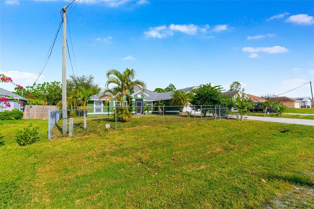 418 Windermere Drive Lehigh Acres, FL 33972 - Photo 7 of 71 a view of a swimming pool