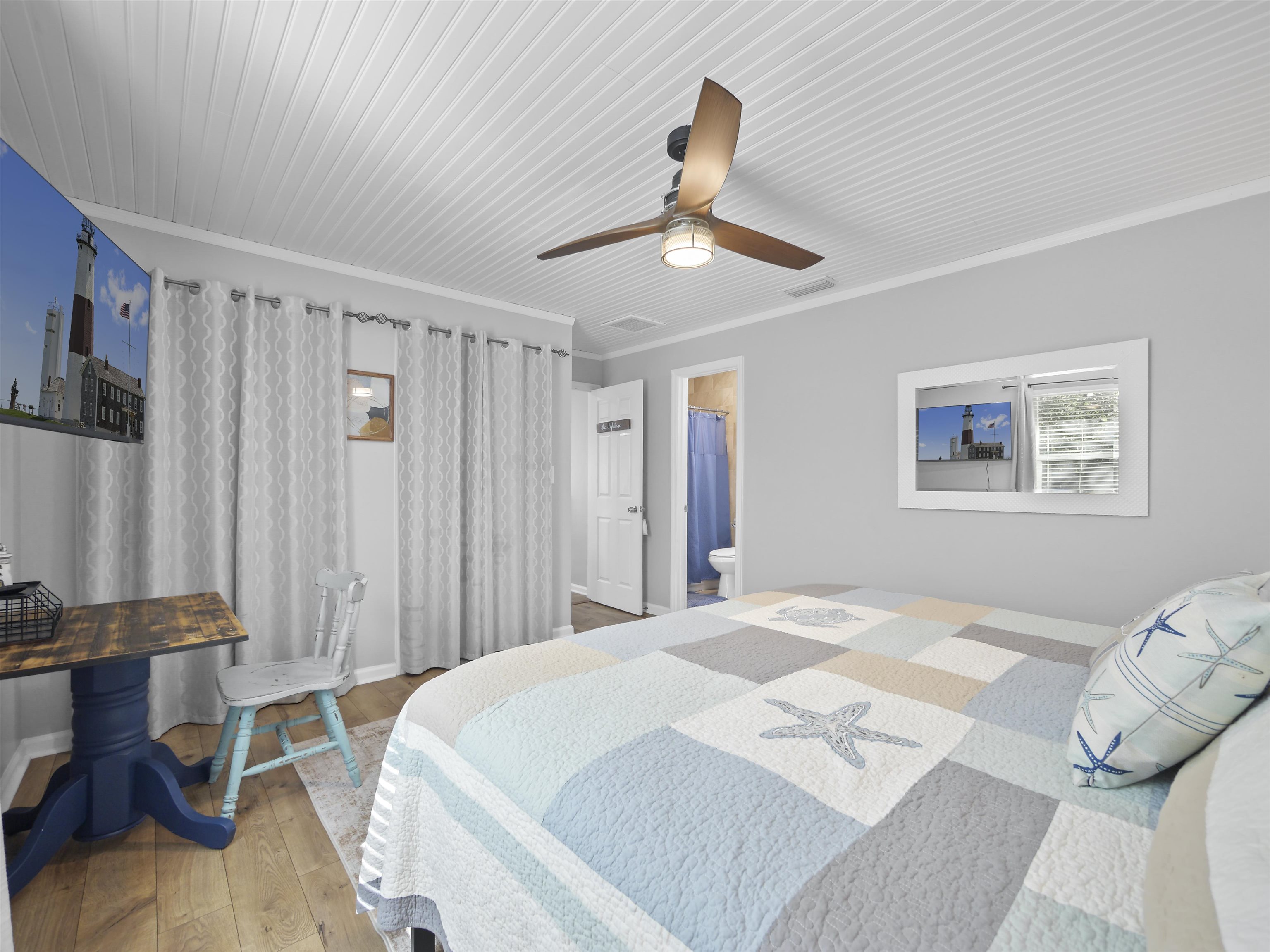 241 Tropic Way St. Augustine, FL 32080 - Photo 16 of 32 a bed room with a bed and a chandelier