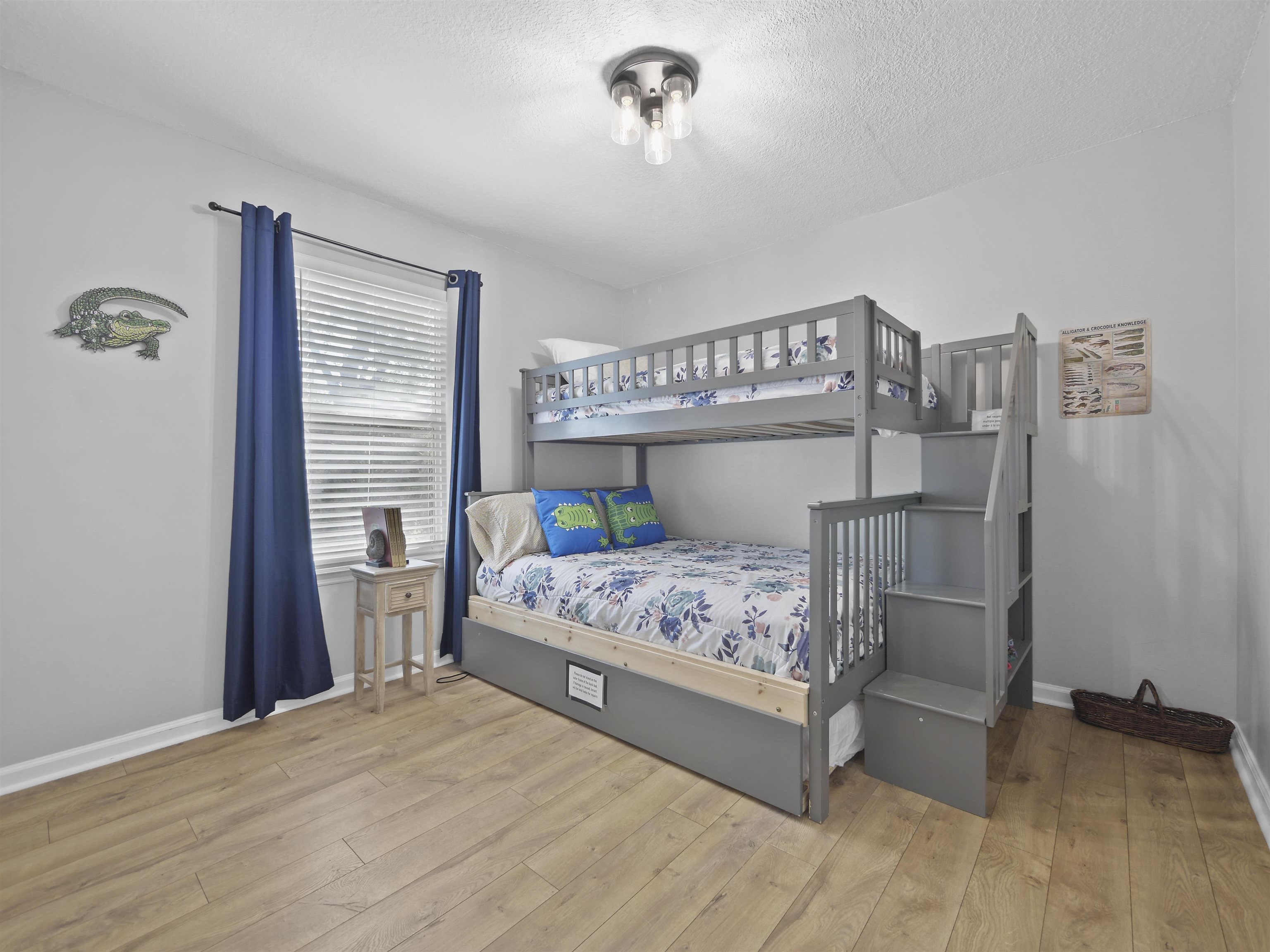 241 Tropic Way St. Augustine, FL 32080 - Photo 19 of 32 a bedroom with a bed wooden floor and window