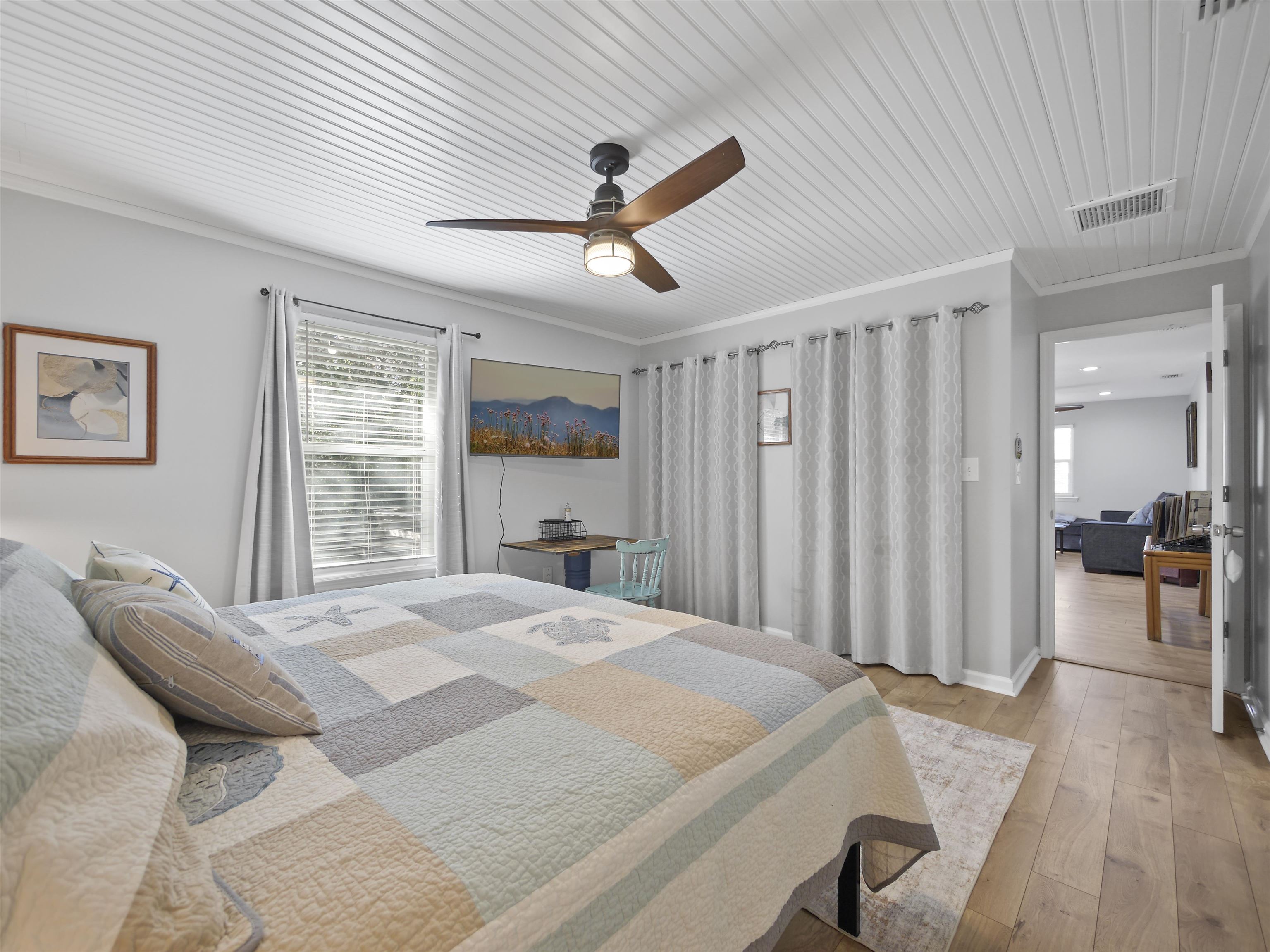 241 Tropic Way St. Augustine, FL 32080 - Photo 4 of 32 a bedroom with a bed and a large window