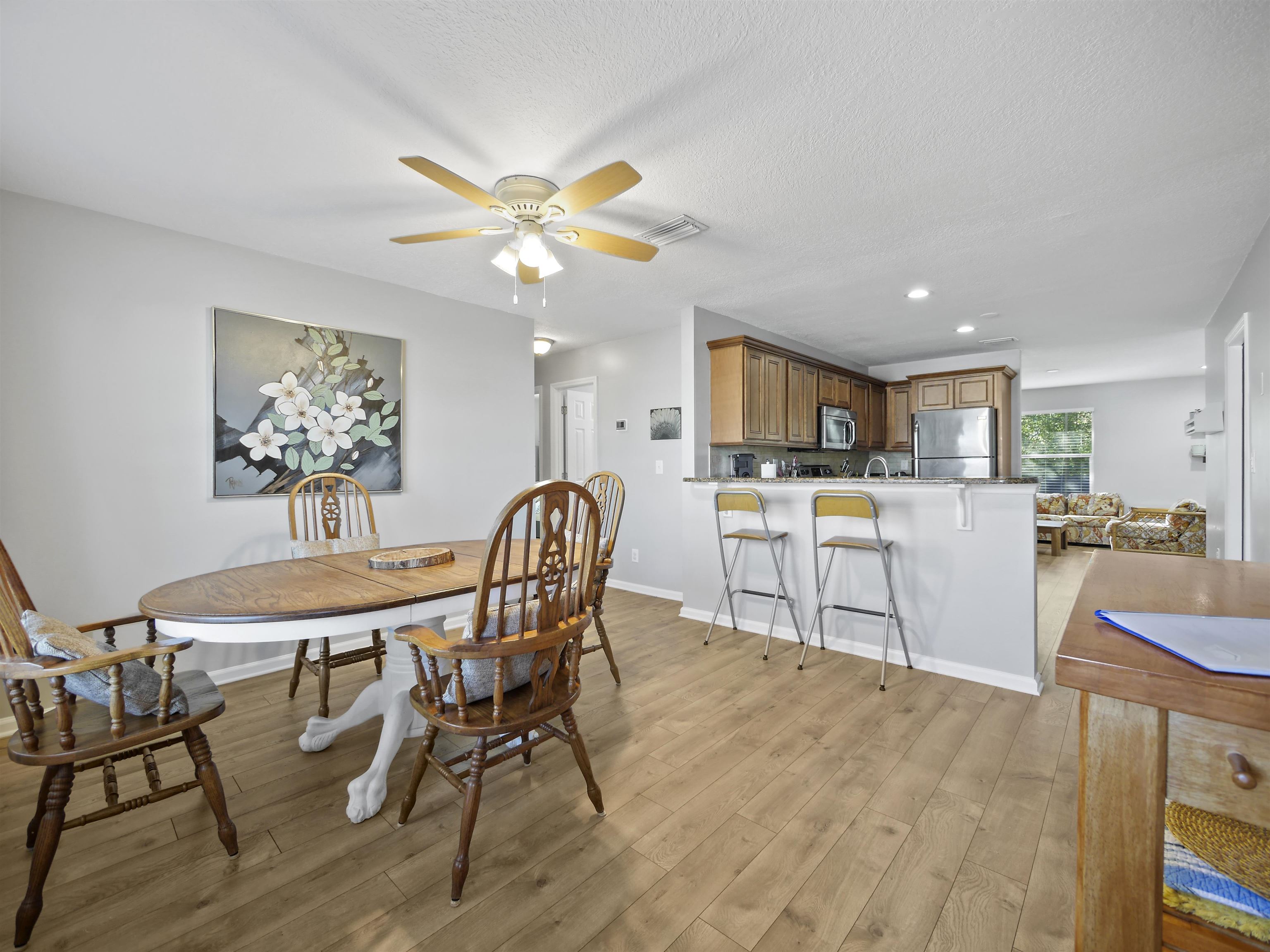 241 Tropic Way St. Augustine, FL 32080 - Photo 7 of 32 a view of a dining room with furniture and a chandelier