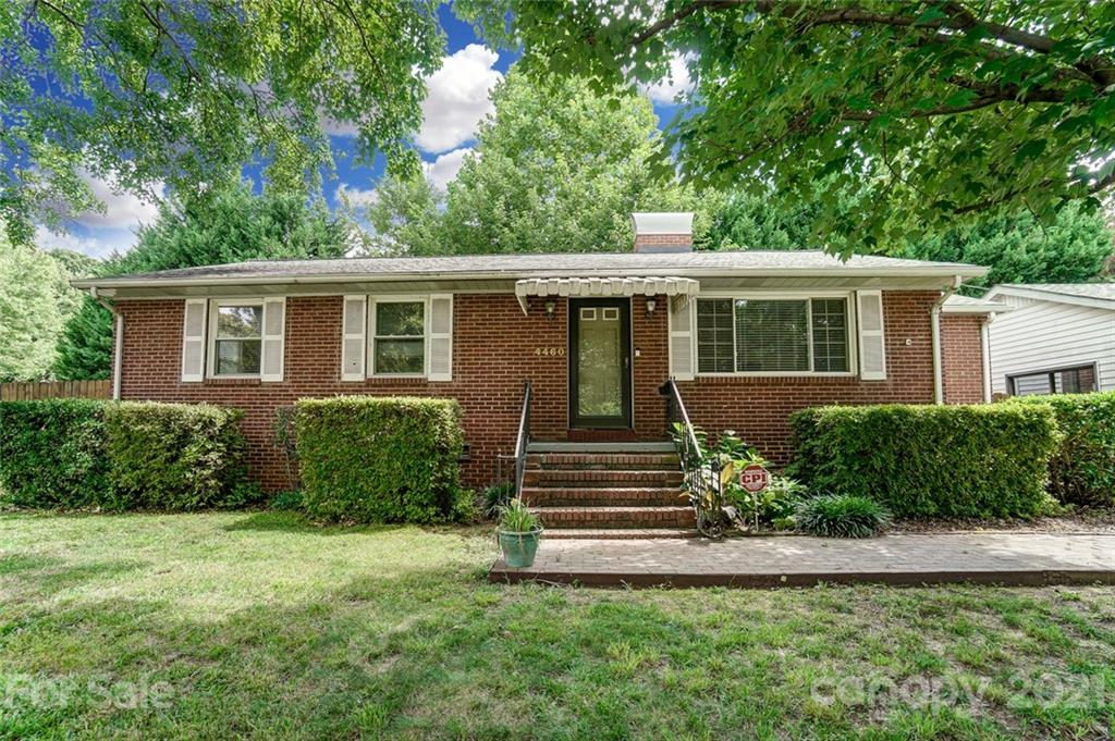 4460 Applegate Road Charlotte, NC 28209 - Photo 1 of 41 a front view of a house with a yard