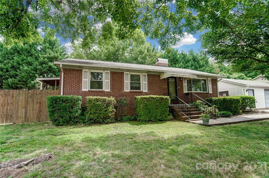 4460 Applegate Road Charlotte, NC 28209 - Photo 2 of 41 a front view of house with yard and green space