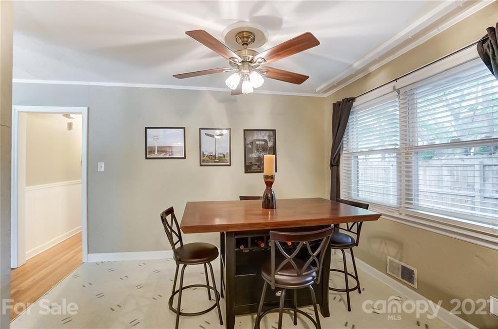4460 Applegate Road Charlotte, NC 28209 - Photo 15 of 41 a dining room with furniture and window