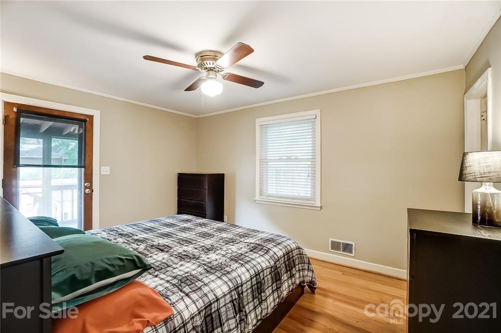 4460 Applegate Road Charlotte, NC 28209 - Photo 16 of 41 a bedroom with a bed and a window