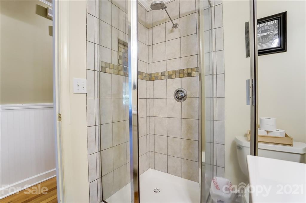 4460 Applegate Road Charlotte, NC 28209 - Photo 26 of 41 a bathroom with a shower