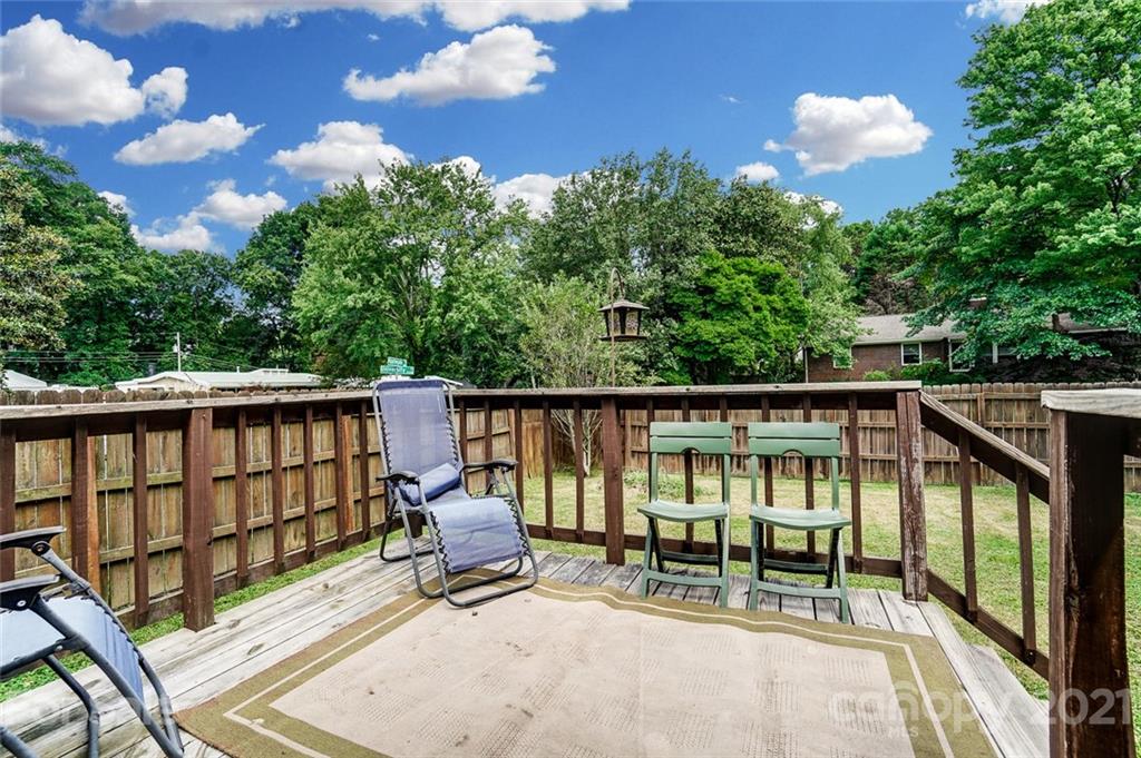 4460 Applegate Road Charlotte, NC 28209 - Photo 36 of 41 a view of a chairs and table in the balcony