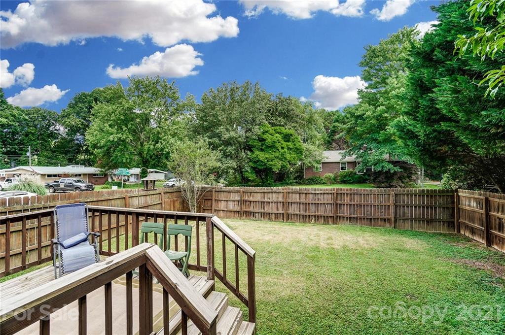 4460 Applegate Road Charlotte, NC 28209 - Photo 37 of 41 a view of a lake with a deck