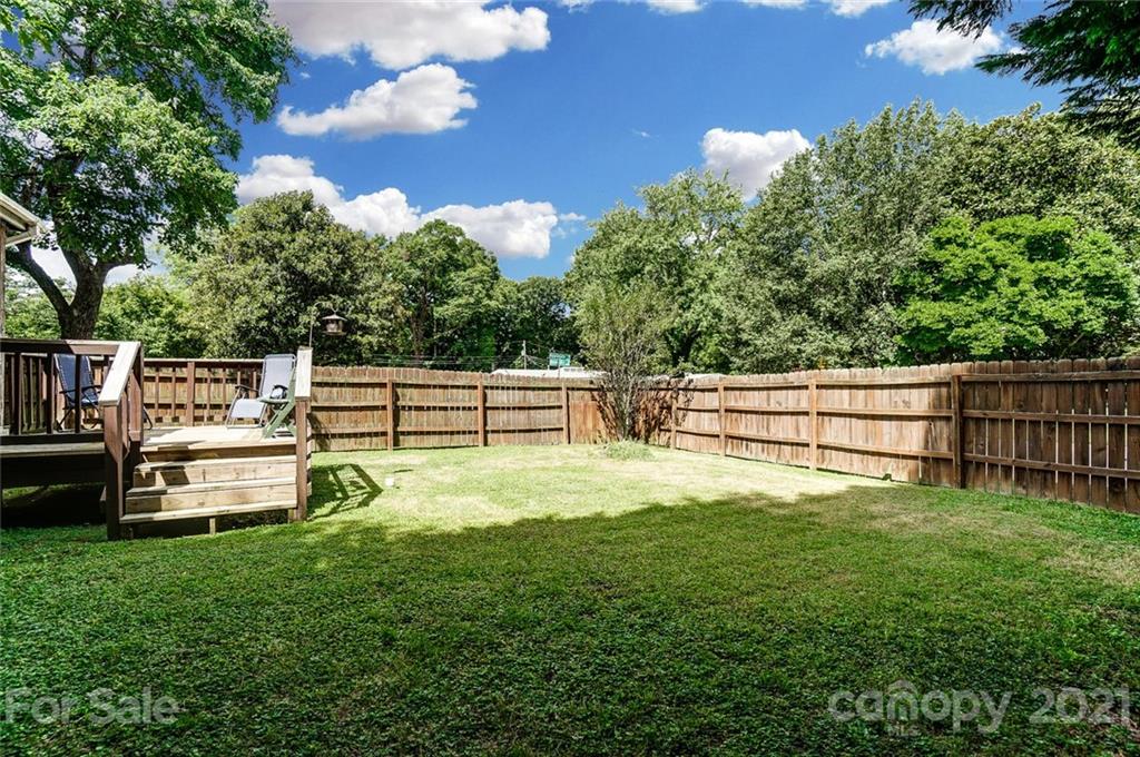 4460 Applegate Road Charlotte, NC 28209 - Photo 38 of 41 a house view with a sitting space and garden