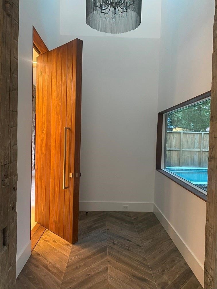 12815 Hansel Lane Houston, TX 77024 - Photo 4 of 5 an empty room with windows