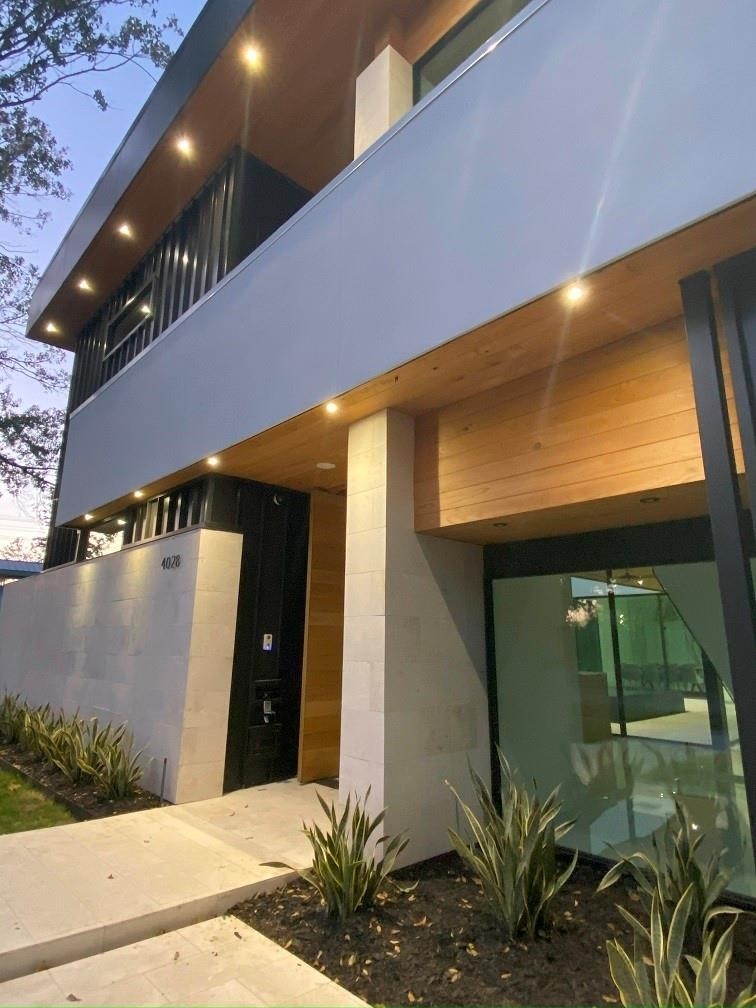 12815 Hansel Lane Houston, TX 77024 - Photo 5 of 5 a swimming pool with yard in front of it