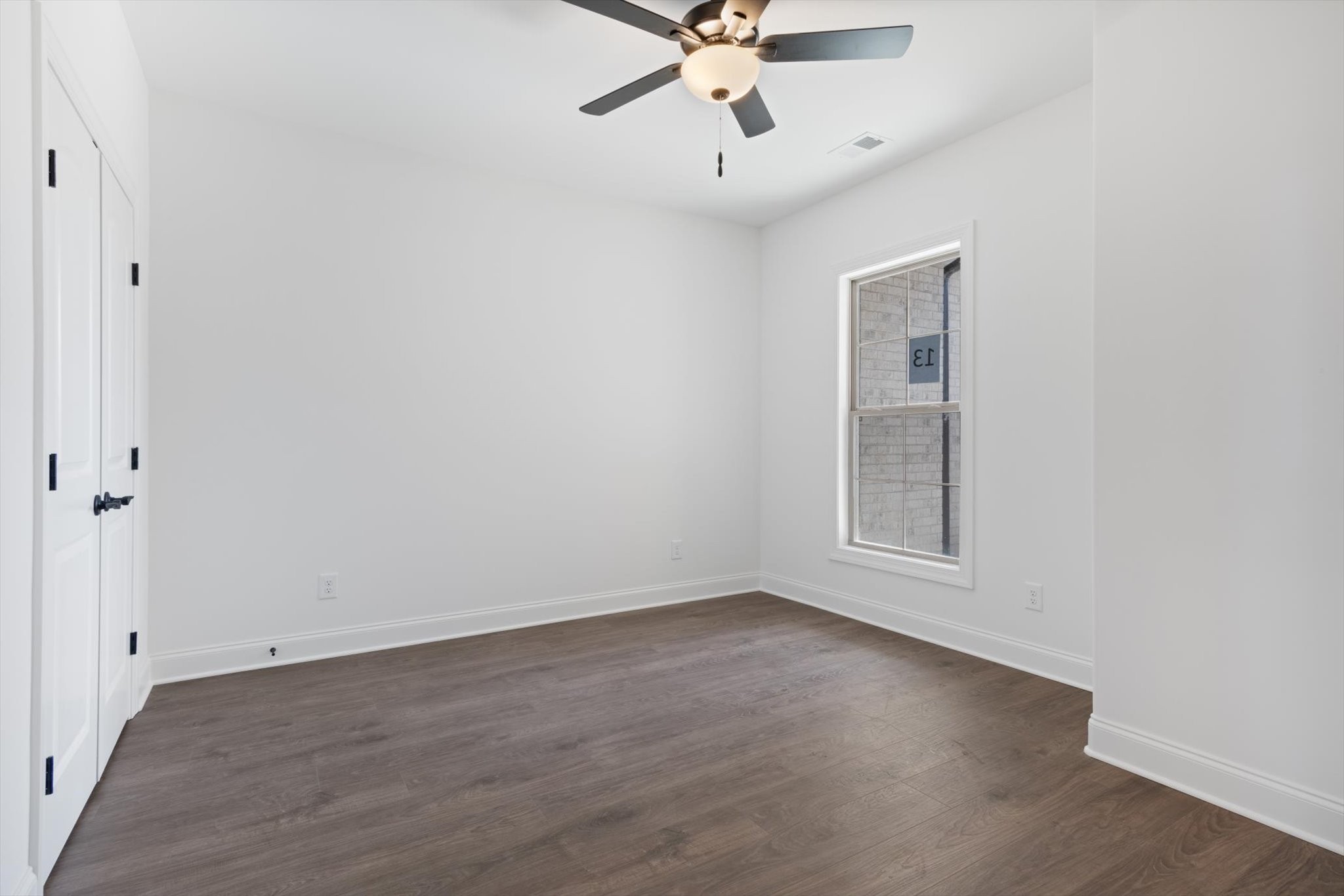 489 West Foxrun Springfield, TN 37172 - Photo 11 of 20 wooden floor in an empty room with a window