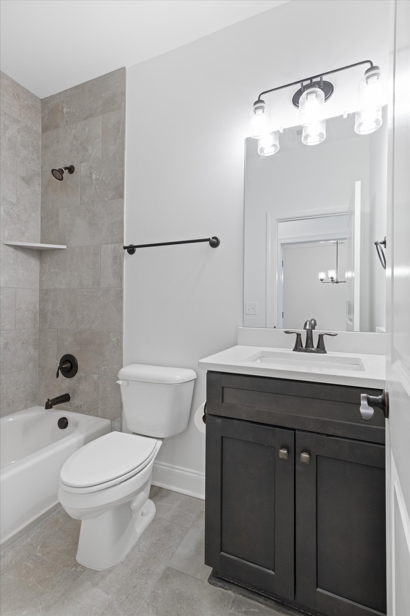 489 West Foxrun Springfield, TN 37172 - Photo 13 of 20 a bathroom with a sink a toilet and a mirror