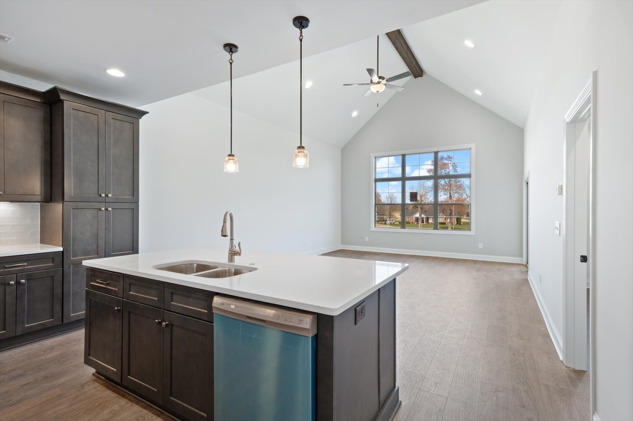 489 West Foxrun Springfield, TN 37172 - Photo 3 of 20 a kitchen that has a sink a refrigerator and a stove